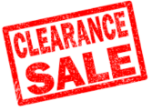 A clearance sale sign, in red font with a white background.